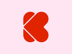 the letter k is made up of two pieces of red paper, and it appears to be cut in half