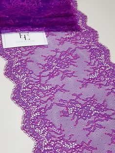 "Lilac with pink color lace trimming. Both sides scalloped. Width: 21 cm/8.3 inches Item number: L9230 Price is set for one meter/yard. You will receive the fabric in one continuous piece if you purchase more than 1 meter/yard. IMPORTANT! Maximum one piece length of this lace trimming is 3 meters/yards. If you buy more than 3 meters/yards of this lace trimming you will receive it in several pieces. Actual color may vary greatly form the color you see on screen. It depends on your devices screen Pink Lace Tulle Fabric For Wedding, Purple Lace Stretch Bottoms, Purple Lace Tulle Fabric For Wedding, Pink Crochet Lace For Party, Purple Wedding Embroidered Lace Fabric, Elegant Pink Lace Tulle Fabric, Party Purple Lace Embroidered Fabric, Purple Lace Fabric Pattern, Purple Lace Fabric For Doll Clothes