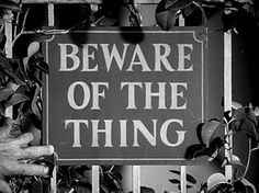 a sign that says beware of the thing