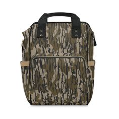 a green and brown camouflage bag with black handles