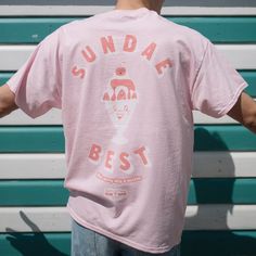 Men's printed t-shirt with “Sundae Best” slogan and vintage style ice cream sundae graphic. Small logo on front, large back print.Make every day a Sunday in this vintage style ice cream graphic tee. Slouchy fit. Makes a great gift and a sweet self purchase for summer staycation. All Batch1 products are lovingly designed, printed and packed by hand in the UK at Batch1 HQ.Our garments are made to order to minimise wastage and printed using water-based, eco-friendly inks. We are committed to creati Cheap Trendy Graphic Design Shirt, Trendy Cheap Graphic Design Shirt, Ice Cream Shop Shirt Ideas, Pink Graphic Tee Men, Ice Cream Merchandise, Retro T-shirt With Back Print For Summer, Retro Ice Cream Shop, Summer Tshirt Designs, Cream Graphic Tee