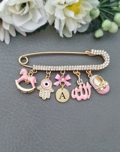 "Note! Current delivery time is about 2-4 weeks. Exclusive Allah Pin for Newborn, Muslim Pin for Baby, Large Gold Allah Stroller Pin, Islamic Baby Gift, Arabic Brooch Gifts for Child 18k gold plated with Swarovski crystals Please leave the personalization details in the \"Note to Seller\" box as you proceed through the checkout process. This makes a beautiful and unique gift for a new Muslimah which will be treasured forever. A perfect Islamic gift for either a new mum on the birth of her baby, Pin Card, Baby Blessing, Trending Bracelets, Hand Of Fatima, Islamic Gifts, Christening Gifts, Keep Jewelry, Custom Baby, New Baby Gifts