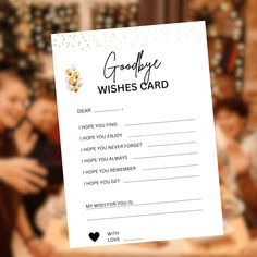 a hand holding up a card with the words goodbye wishes card written in front of it