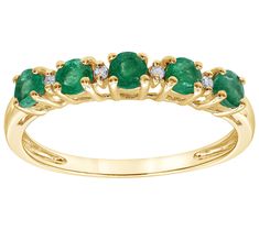 Adorn yourself with the romantic beauty of this luxurious ring adorned with a band of extravagantly arranged gemstones. From Affinity. Elegant Half Eternity Emerald Ring, Elegant Half Eternity Emerald Ring For Anniversary, Elegant Emerald Half Eternity Ring, Elegant Round Emerald Ring With Half Eternity Setting, Elegant Round Emerald Ring With Half Eternity Band, Elegant Emerald Ring With Gemstone Accents, Elegant Diamond Ring With Gemstone Accents, Elegant Emerald Ring With Diamond And Gemstone Accents, Elegant Diamond Emerald Ring With Gemstone Accents