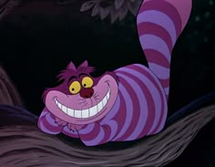 an animated character with large teeth and striped purple stripes on it's face, smiling