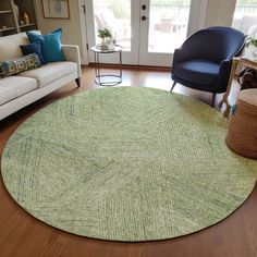 a living room with a rug on the floor