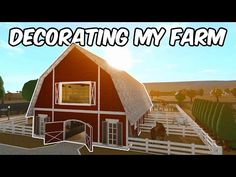 a red barn sitting on top of a lush green field