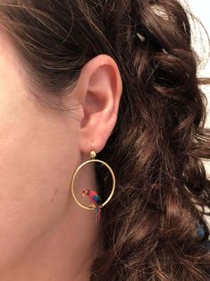 For Sale on 1stDibs - Whimsical bird earrings depict colorful parrots in red, blue and green enamel perched within delicate hoops of 15 karat yellow gold. Stamped 15K. Fitted Multicolor Bird Design Jewelry, Colorful Parrots, Bird Earrings, Green Enamel, Gold Enamel, Parrot, Red Blue, Art Nouveau, Dangle Earrings