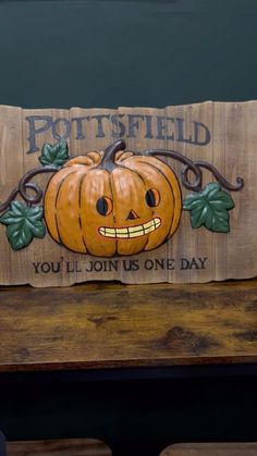 a wooden sign that says pottsfield you'll join us one day