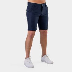 Discover ultimate style and comfort with Ultra-Stretch Chino Shorts in Navy. Crafted with luxurious fabric that offers exceptional stretch and comfort. Dress them up or down, as they exude sophistication and style. Whether paired with an essential tee or a button-up shirt, you'll enjoy a classy and comfortable look all day long. ✓ Versatile Fit - A perfectly fit with stretch to accommodate larger muscular thighs & glutes. ✓ Ultra-Stretch - Luxurious feeling rayon-nylon-elastane blend to give ful Casual Fitted Pants With Built-in Shorts, Fitted Knee-length Shorts For Business Casual, Fitted Bermuda Shorts With Pockets, Fitted Pants With Built-in Shorts, Casual Fitted Knee-length Shorts, Fitted Cotton Knee-length Shorts, Fitted Bermuda Business Casual Shorts, Fitted Cotton Modern Shorts, Modern Stretch Short Bottoms