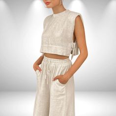 Elevate your style with our chic Women's Cotton Linen Slim Crop Top and Pants Set--the perfect ensemble for 2024 summer. This trendy 2-piece outfit features a sleeveless lace-up crop top and wide-leg long pants, ensuring you stand out with effortless elegance. Nature-inspired colours. Prewashed linen, so it won't shrink and no colour is lost after washing. A gift for her. Key Features: Available in: Beige, Deep brown, Blue, Parrot Green, Orange, Pink Sizes: small, medium, and large. please refer Crop Top And Pants Set, Blue Parrot, Parrot Green, Stylish Crop Top, Linen Crop Top, Cotton Linen Pants, Effortlessly Chic Outfits, Pant Sets, Cropped Tops