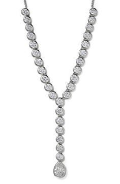 This bezel-lined necklace is filled with sparkling cubic zirconia and hand-polished to perfection to ensure you shine. 16" length; 2" extender Rhodium-plate/cubic zirconia Imported Formal Drop Necklace With Bezel Setting, Formal Drop Necklaces With Bezel Setting, Silver Diamond Long Drop Necklace, Classic Silver Necklace With Channel Set, Classic Silver Necklace Channel Set, Classic Silver Channel Set Necklace, Formal Fine Jewelry Necklaces Channel Set, Formal Fine Jewelry Necklace Channel Set, Formal White Gold Channel Set Necklace