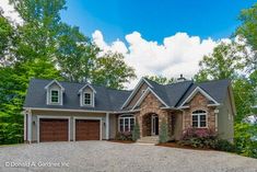 a large house in the middle of a wooded area