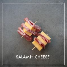 ham and cheese on skewers with the words salami + cheese above them