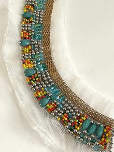 "Beaded Stone, Pave Chain Neckline Collar Applique, Bridal Applique,Stone Beaded, Silver Ball, Round Neckline Statement Boho Chic Bib, Make A Statement with this beautiful multi color bead work collar applique! Mesh Size 12\" W x 2 3/4\" L Bead Length: 1 3/8\" Long" Bohemian Rhinestone Necklace For Festivals, Party Embellished Beaded Necklaces With Round Beads, Bohemian Embellished Necklaces For Party, Bohemian Embellished Necklace For Party, Bridal Applique, Blouse Design Models, Diy Embroidery, Work Blouse, Blouse Design