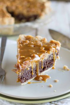 a piece of pie sitting on top of a white plate