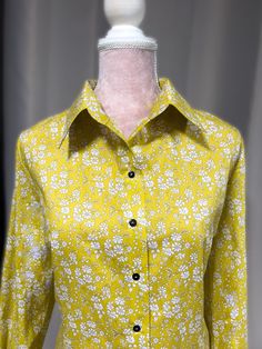 Liberty print woman's shirt 100% cotton Buttons I will process the order within 3-5 days Returns:  I'm unable to accept returns I'm afraid, however I am more than happy to answer all of your questions prior to your purchase. Please feel free to message me. Fitted Printed Blouse For Workwear, Classic Patterned Long Sleeve Shirt, Printed Button-up Office Shirt, Classic Long Sleeve Patterned Shirt, Summer Long Sleeve Shirt With Covered Buttons, Classic Floral Print Button-up Shirt, Classic Button-up Shirt With Floral Print, Classic Patterned Shirt For Spring, Fitted Yellow Printed Shirt