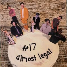 a cake with the words 17 almost legal written on it, surrounded by photos of men in suits and ties