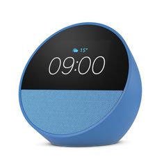 an alarm clock sitting on top of a blue and black speaker system with the time displayed