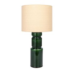 a green glass table lamp with a white shade on the top and bottom part of it