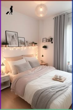 a white bed sitting in a bedroom next to a window covered in curtains and lights