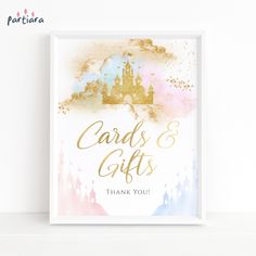 a watercolor painting with the words cards and gifts in gold foil on it, next to a white shelf