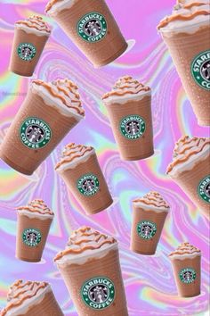 many starbucks cups are in the middle of an abstract background with pink and blue swirls