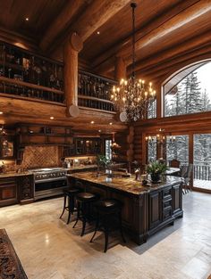 a large kitchen with an island and chandelier