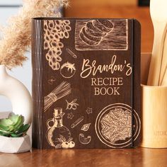 a cookbook sitting on top of a wooden table