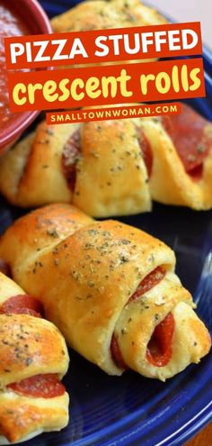 pizza stuffed crescent rolls on a blue plate