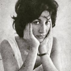 black and white photograph of a woman with her hand on her face