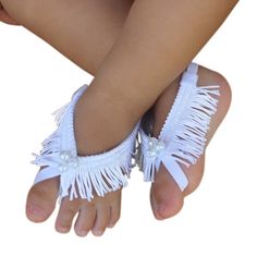 "Baptism Baby Sandals, White Sandals, White Barefoot Sandals, Barefoot Baby Sandals, Baby Barefoot Sandals, Baby Accessories These White Fringe Baby Barefoot Sandals are just perfect for any age! The front part of this sandal will not stretch but there is enough stretch elastic on the back for a perfect fit.  All my products are designed to make your baby look beautiful while feeling really comfortable. Perfect for photo shoots and to wear to a special occasion. My Baby Headbands and Baby Barefo Barefoot Sandals Baby, Beach Wedding Shoes, Baby Pearls, White Fringe, Baby Sewing Projects, Baby Sandals, Bow Sandals, Sandals White, Foot Jewelry