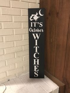 a wooden sign that says it's october witches