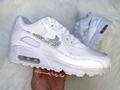 Bling Air Max 90 Premium Shoes Hand Customized with Genuine Swarovski Crystals **Please note that these are Youth shoes; the size you order will correlate to the correct Youth size. Colors: White w/ White Soles Model and Color Code: #833412-100 Note: Box may be missing top lid or shoe box Each and every Swarovski crystal is set by hand with top quality, permanent adhesive. Our products come direct from the manufacturer or authorized retailers, and are 100% authentic.  We offer free crystal repla Bling Nike Shoes, Nike Trainer, Swarovski Nike, Looks Hip Hop, All White Sneakers, Air Max 90 Women, Air Max 90 Premium, Nike Air Shoes, Bling Shoes