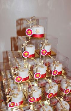 a display case filled with lots of small cakes