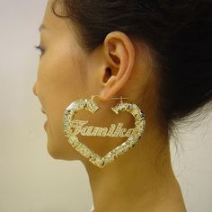 "*Personalized Name Puffy Heart Shape Bamboo Hollow Hoop Earrings. *Earrings Height : 6.3cm ( 2 1/2 Inch)- Width : 7.5cm ( 3 Inch). *Up to 9 Characters. *Made with 100% 10K Yellow Gold, We don't offer any plated or gold filled jewelry at all. *Name Thickness: 0.45mm / 26 Gauges / 0.018\" Approx. *These name plates cut out by latest technology laser machine and diamond cut finish- bling bling, top quality guaranteed. *Offer 1 year free warranty and from the date of you receive, you have 14 days t Personalized Gold Heart Earrings, Personalized Gold Jewelry With Letter Print, Gold Letter Print Jewelry For Anniversary, Personalized Heart Earrings For Anniversary On Mother's Day, Personalized Heart Earrings For Anniversary And Mother's Day, Custom Text Jewelry For Anniversary On Valentine's Day, Custom Text Jewelry For Valentine's Day Anniversary, Custom Name Gold Earrings For Valentine's Day, Custom Name Letter Jewelry For Valentine's Day