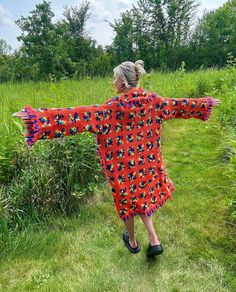 Introducing my latest creation! Upcycled a unique, beautiful vintage orange crochet blanket into this dream statement coat for any orange lover. Perfect for breezy seaside mornings, late nights at festivals, campfires, or lounging around the house. Measurements: Length: 48" Bust: 52" Sleeve Length: 22" Model is 5'10 for reference. Wash on a gentle cycle, lay flat to dry. This statement jacket was made with all of my heart, for any human, anywhere, that may be attracted to its vibe! My intention Red Spring Cardigan For Vacation, Red Spring Vacation Cardigan, Red Cardigan For Beach In Spring, Red Cardigan For Spring Beach Outings, Red Fall Vacation Cardigan, Summer Bohemian Orange Outerwear, Red Cardigan For Fall Vacation, Bohemian Orange Outerwear For Summer, Red Summer Beach Outerwear