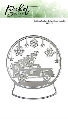 a snow globe with a truck in the center and christmas decorations on it's side