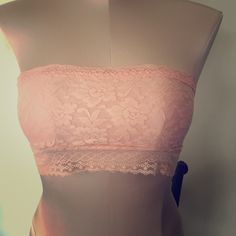 Never Worn. Light Pink Lace, Jersey Lined In Front, Sheer In The Back. Strapless Seamless Pink Crop Top, Pink Fitted Strapless Bra, Seamless Lace Bandeau Bra, Pink Seamless Strapless Tube Top, Summer Bandeau Lace Bra, Stretch Lace Strapless Tube Top, Feminine Stretch Bandeau Tube Top, Lace Strapless Tube Top Bra Friendly, Lace Strapless Bra-friendly Tube Top