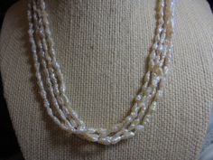 FOUR STRAND fresh water cultured GOLD TONE  silver  SLIDE HOOK CLASP  RICE PEARL NECKLACE    17 IN.  NECKLACE .    THANKS  PLEASE CHECK OUT PICS Rice Pearl Necklace, Fresh Water Pearl Necklace, Water Pearl Necklace, Rice Pearls, Cultured Pearl Necklace, Pearl Necklaces, Wedding Jewellery Necklace, Hook Clasp, Freshwater Pearl Necklaces