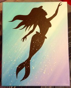 an acrylic painting of a mermaid swimming in the ocean