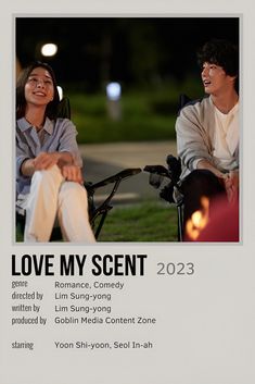 a poster for love my scene with two people sitting on the grass and one person looking up