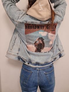 Keep Your Style Looking Sharp With Our Wallen Inspired Broadway Girls Denim Jacket Who doesn't love a good denim jacket?! Light Acid Wash Denim Button down jean jacket with decal design on back. 2 chest pockets Fold-Over Collar Machine wash cold water with like colors. Do not bleach. Lay flat to dry. Warm iron on the reverse side. Can be dry cleaned. Custom Denim Jacket, Girls Denim Jacket, Boho Boutique, Custom Denim, Acid Wash Denim, Stay Wild, Decal Design, Denim Button Down, Girls Denim