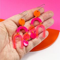 Bright and bold in hot pink, neon pink and orange to bring that ZING to your outfit! These are 2 1/2 inches long on handcrafted titanium earwires Pink Neon, Colorful Earrings, Metal Earrings, Gorgeous Earrings, In Hot, Neon Pink, Ring Necklace, Statement Earrings, Pink And Orange