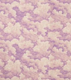 a purple and white background with clouds in the sky on it's surface,