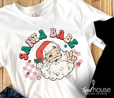 SANTA BABE Groovy Shirt, Cute Christmas Graphic Tee, pajamas, pjs t-shirt for party Holiday Casual T-shirt With Custom Print, Casual Holiday T-shirt With Custom Print, Fun White T-shirt For Holiday, Funny Graphic Print T-shirt For Holidays, Fun Letter Print T-shirt For Holiday, Fun Holiday T-shirt With Graphic Print, Holiday Graphic Tee With Funny Print, Fun Graphic Print T-shirt For Holiday, Fun Holiday Graphic Print T-shirt