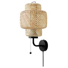 a wall mounted light that is on the side of a white wall and has a woven shade