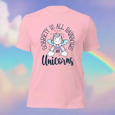 This unisex tee is a great way to show your commitment and pride in sobriety while radiating positivity. Featuring a creative and fun design that celebrates sobriety being all rainbows and unicorns, this t-shirt is perfect for any occasion. 🌈🦄 • 100% combed and ring-spun cotton (Heather colors contain polyester) • Fabric weight: 4.2 oz./yd.² (142 g/m²) • Pre-shrunk fabric • Side-seamed construction • Shoulder-to-shoulder taping • Blank product sourced from Nicaragua, Mexico, Honduras, or the US This product is made especially for you as soon as you place an order, which is why it takes us a bit longer to deliver it to you. Making products on demand instead of in bulk helps reduce overproduction, so thank you for making thoughtful purchasing decisions! • Traceability: - Weaving—India, Sou Pride Funny Print Short Sleeve T-shirt, Pride Funny Print Crew Neck T-shirt, Funny Print Short Sleeve T-shirt For Pride, Short Sleeve T-shirt With Funny Print For Pride, Pink Novelty T-shirt With Funny Print, Unicorn Print Graphic Tee With Crew Neck, Radiating Positivity, Rainbows And Unicorns, Embroidered Hats