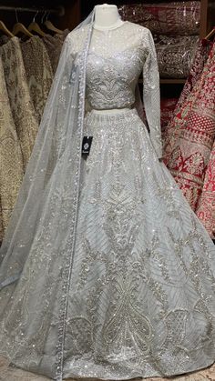 Cloudy grey intricate with fully sequence, studs motifs thread embroidery and crystal stone work lehenga embellished with pearl design paired with high neck blouse and net dupatta. Fabric: Net Size:38 Ready to Ship! Indian Lehangas, Stone Work Lehenga, Eid Fits, Walima Dresses, Desi Fits, Party Wears, Cultural Fashion, Indian Bridesmaid Dresses, Pengantin India