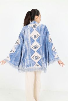 Introducing our unique Bohemian Beige Kimono, adorned with striking eye embroidery. This lightweight fringe cardigan is perfect for adding a touch of boho chic style to any outfit. Whether you're lounging at home, heading to the beach, or looking for a stylish cover-up, this open-front jacket offers both comfort and fashion. The intricate eye embroidery symbolizes protection and adds a unique, artistic flair to your wardrobe. *Design: Beige kimono with eye embroidery *Material: Lightweight and b Beige Kimono, Beach Kimono, Casual Beach Wear, Kimono Vintage, Bohemian Lifestyle, Boho Kimono, Womens Kimono, Lightweight Cardigan, Bridesmaid Robes